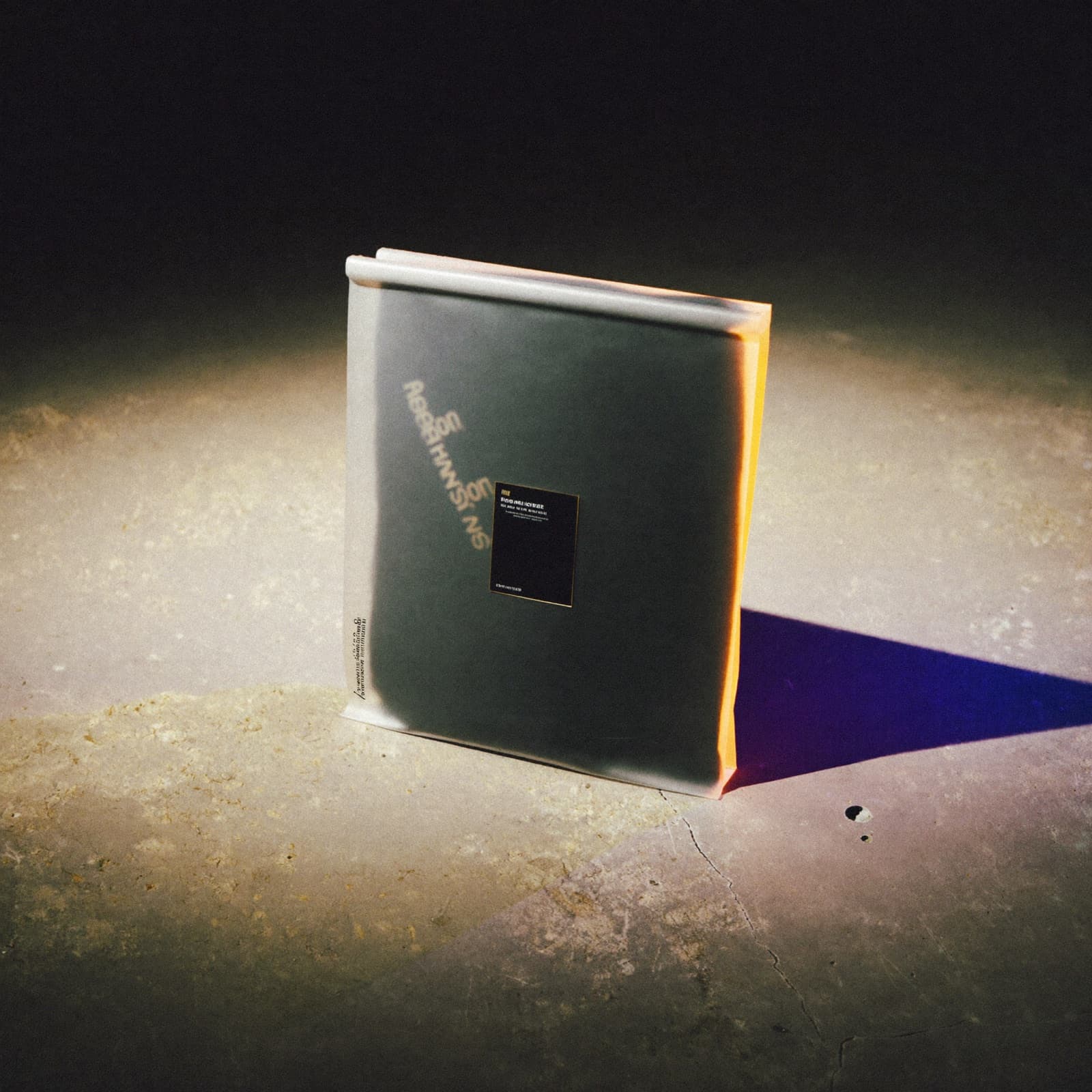 Verus campaign visual — a matte pouch lit hard on concrete